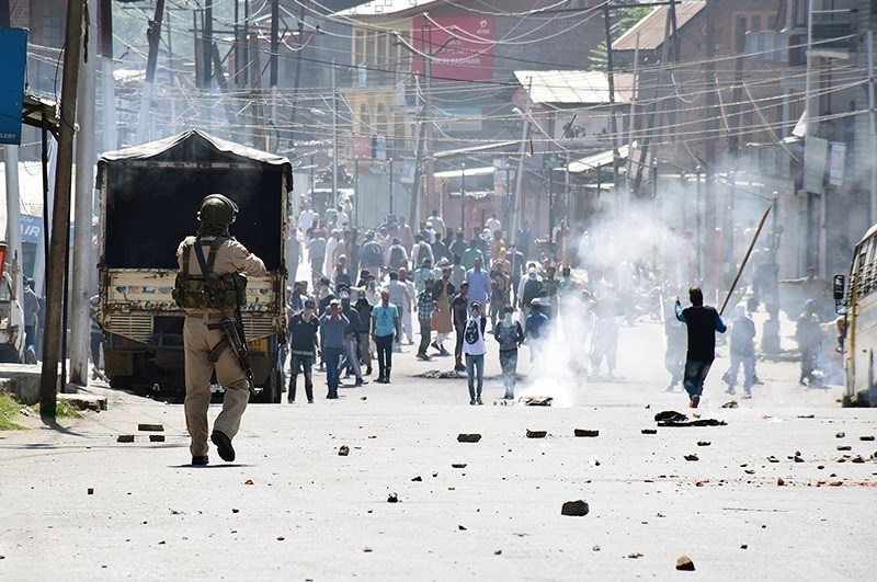 Police confront protestors in Kashmir during a December 2018 demonstration. Photo: Seyyed Sajed Hassan Razavi via Wikimedia Commons