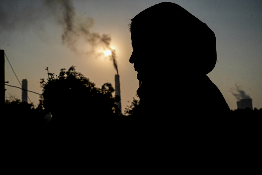 Just 300 meters away from Uncha Gaun, one of India’s largest coal- and gas-fired thermal power plants, operated by the National Thermal Power Corporation Limited (NTPC), emits pollution. The plant is located 48 km from Delhi. Photo: Suhail Bhat