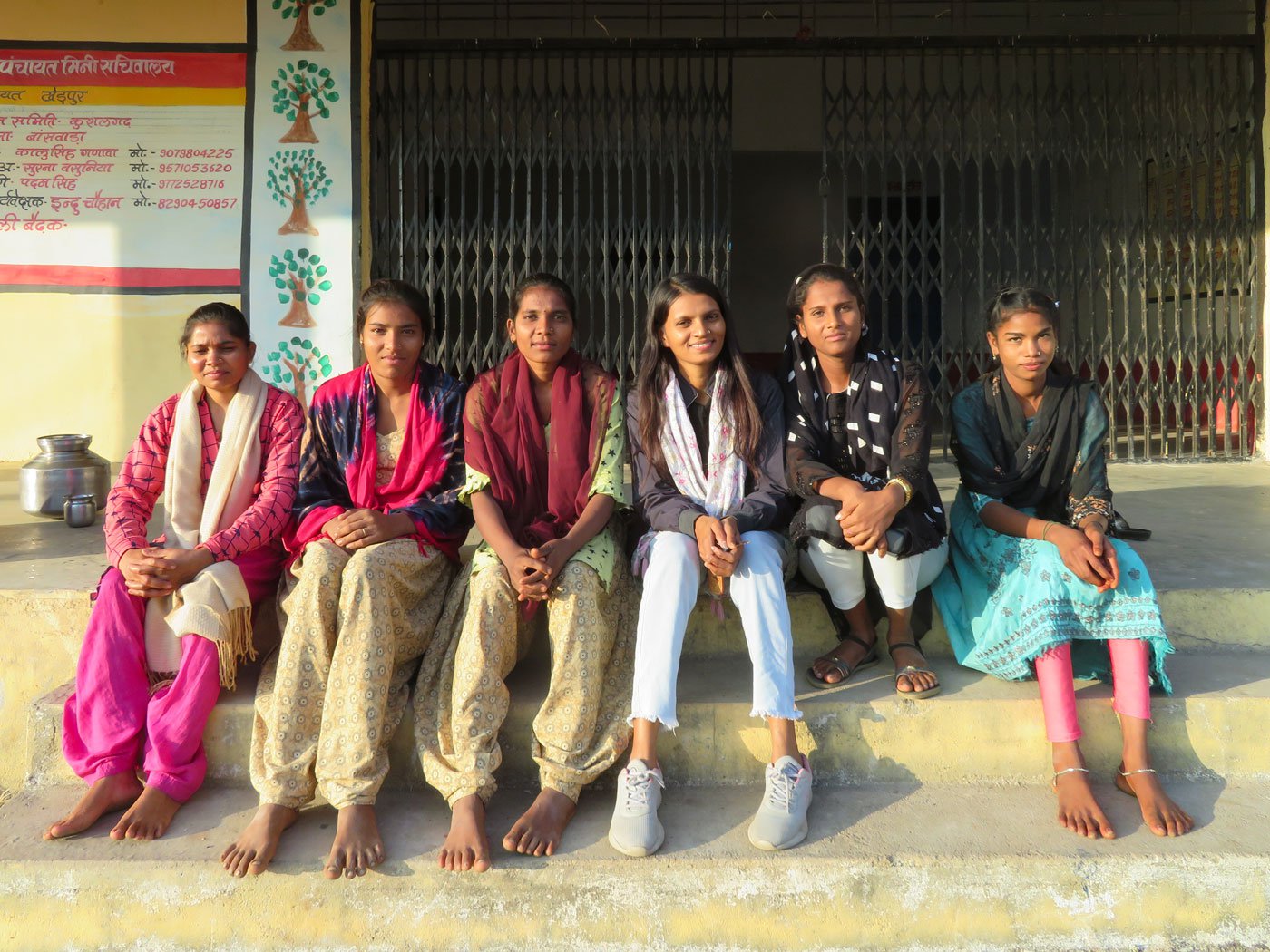 Menka (wearing blue jeans) with girls from surrounding villages who come for the counselling every Saturday afternoon. Photo: Priti David/PARI