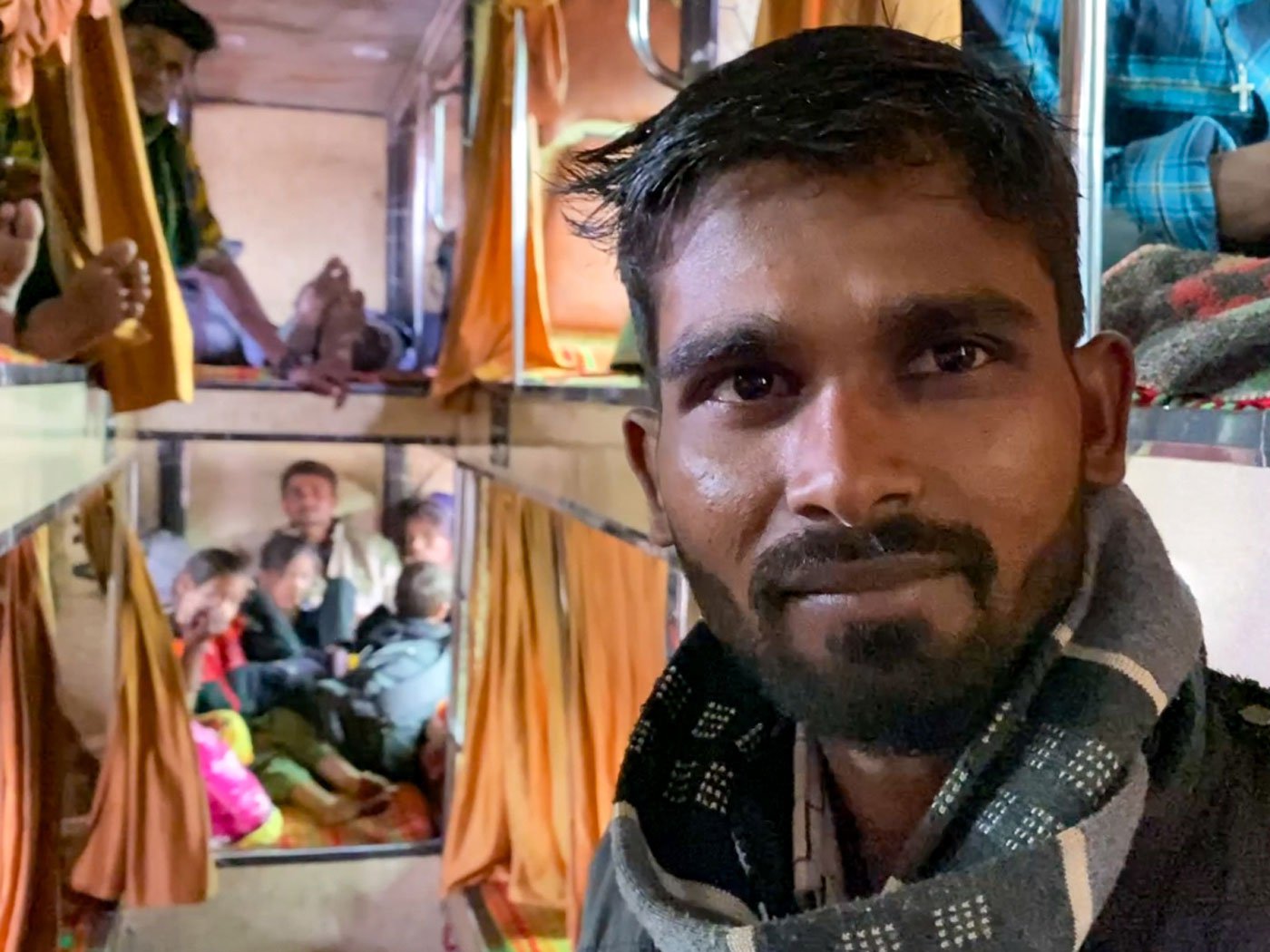 Suresh Maida is from Kherda village and migrates multiple times a year, taking a bus from the Kushalgarh bus stand to cities in Gujarat. Photo: Priti David/PARI