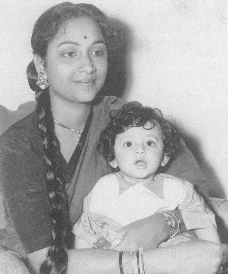 Geeta with a young Tarun Dutt, their son.