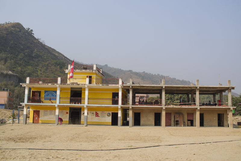 The schoolyard of Pashupati Basic School ravaged by floods. Photo: NIMJN