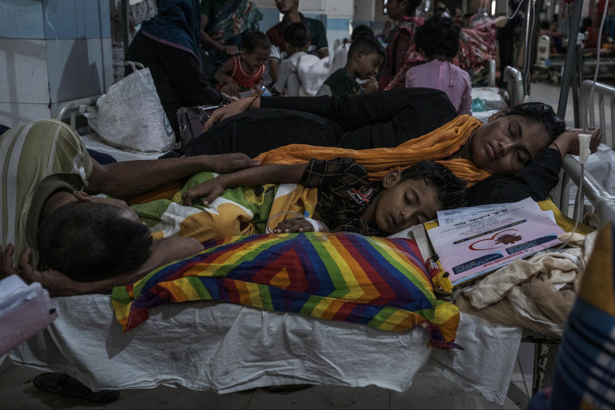 This is an image of a family taking care of an infected child.